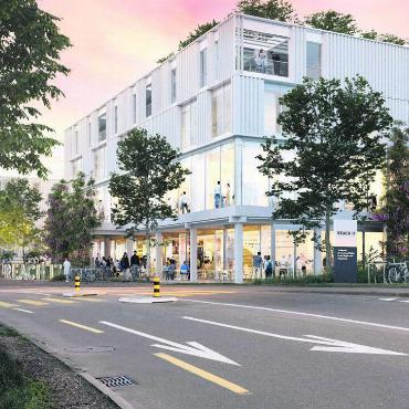 Treffpunkt schafft Mehrwert - Passt optimal ins Quartier: An der Friedhofstrasse realisiert die Raiffeisenbank Wohlen mit der Überbauung «Reach 17» (von Süden aus gesehen) einen vielfältigen Begegnungsort, der Wohlen und das Freiamt bereichern soll. Bild: pd