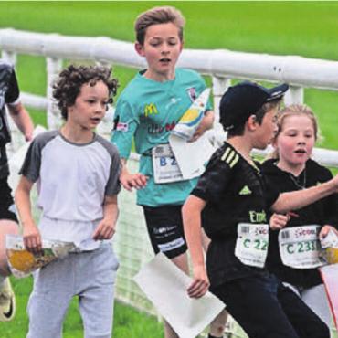 So ein cooler Tag - Der OL ist bei den meisten Kids beliebt: Gerangel am Posten. Bild: pd