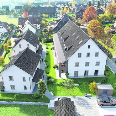 Geschichten neu schreiben - Die Visualisierung zeigt, wie sich die Überbauung zwischen Bachstrasse und Kirchweg einbetten wird. Bild: zg