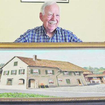 Auf dem Schlitten durchs Dorf - Zu Hause hat der ehemalige Bäckermeister ein grosses Gemälde, welches zeigt, wie der Betrieb früher ausgesehen hat.