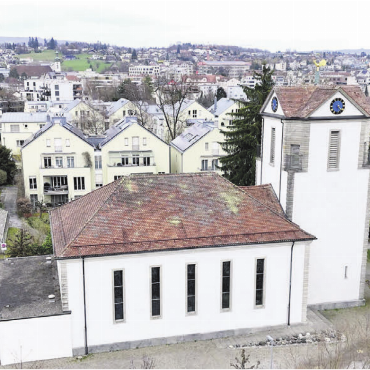 Bis hierher hat Gott geholfen - Seit 100 Jahren prägt die reformierte Kirche Wohlen den Hübelacker beim Bahnhof.